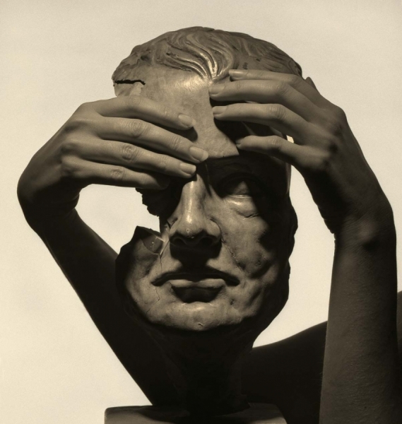 Photograph Antonia Deutsch Hands On Mask on One Eyeland